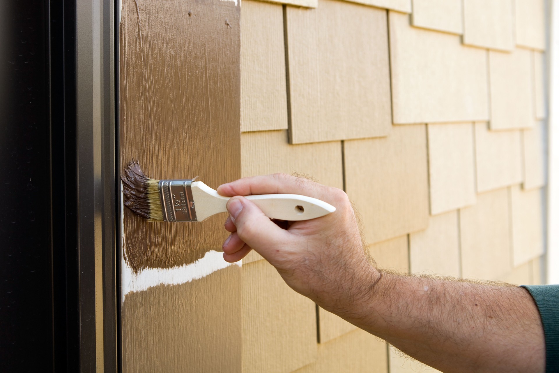 Painter Cutting in Door Trim with a Brush